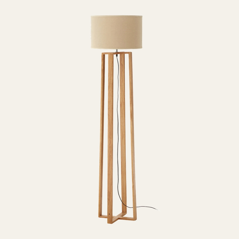 Aelia Wooden Floor Lamp with light oak open-frame tall wooden base, beige fabric drum shade and visible black cord