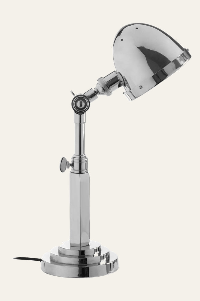 Alina Glass Table Lamp — polished chrome dome shade on an adjustable articulated arm, faceted column and stepped round base with visible cord