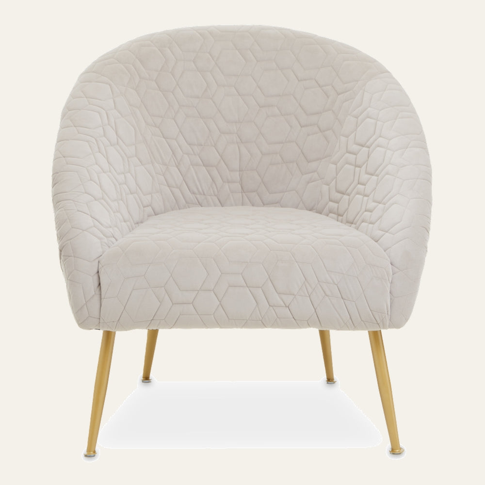 Amathia Chair — cream quilted barrel chair with hexagon stitch pattern and slim gold metal legs