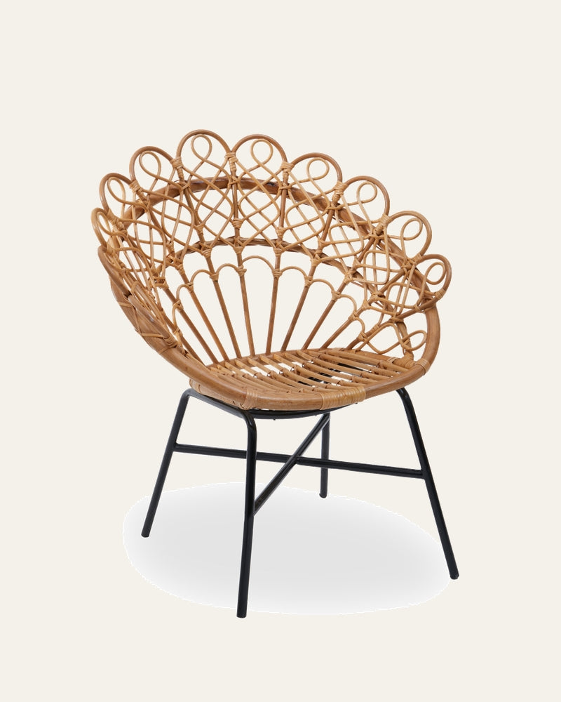 Amavaya Rattan Peacock Chair with natural woven rattan peacock-style back and slatted seat on black metal legs