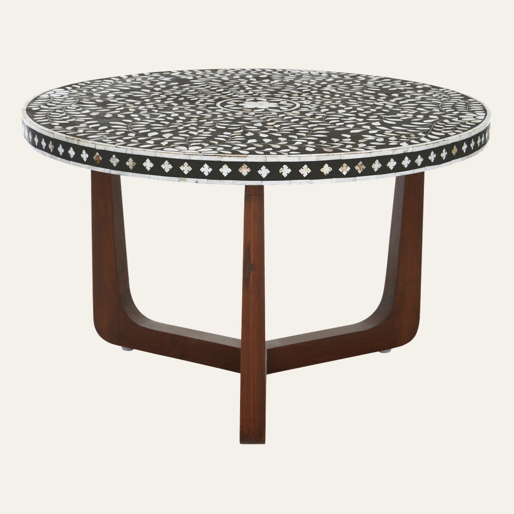 Aranelle Pearl Round Coffee Table with round black-and-white pearl inlay floral top and dark brown curved wooden three-leg base