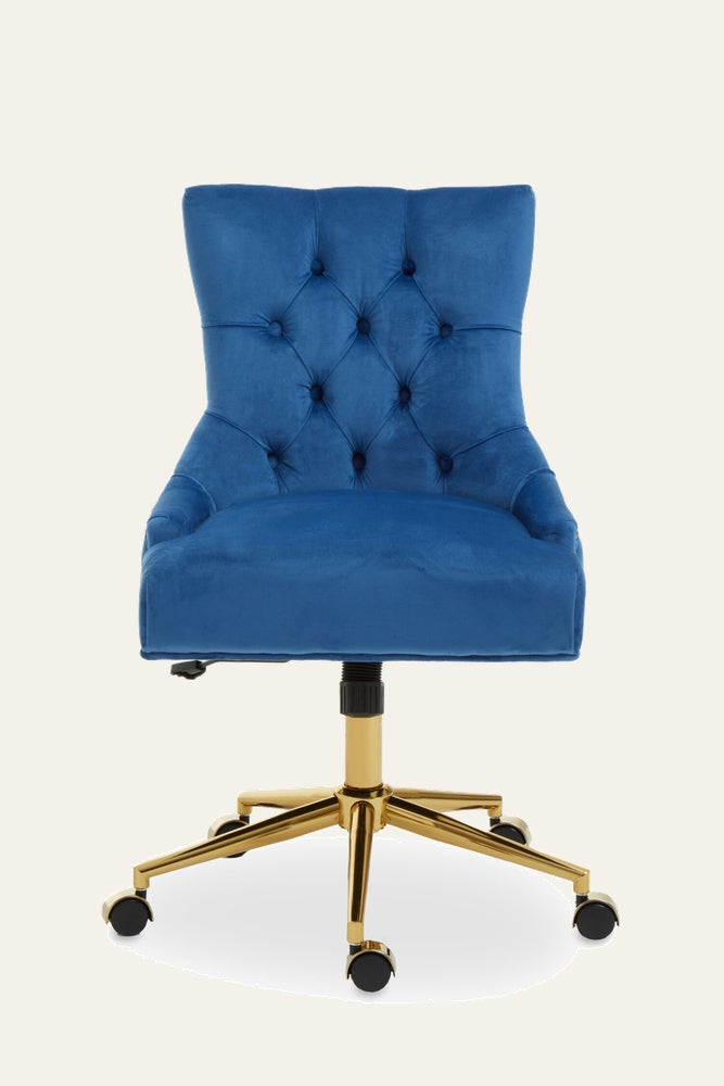 Arkor Velvet Desk Chair with deep blue velvet upholstery, diamond button-tufted back and curved arms, mounted on a polished gold five-star base with caster wheels.