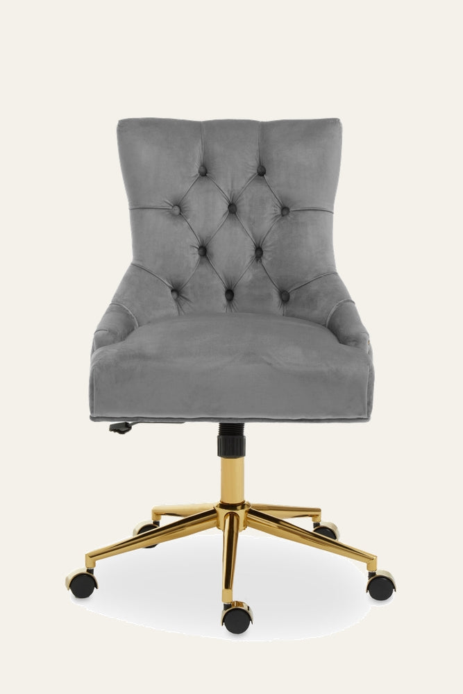 Arkor Velvet Desk Chair with gray tufted velvet upholstery and button detailing, contoured seat and back, gold metal five-star base with casters and visible height-adjustment lever