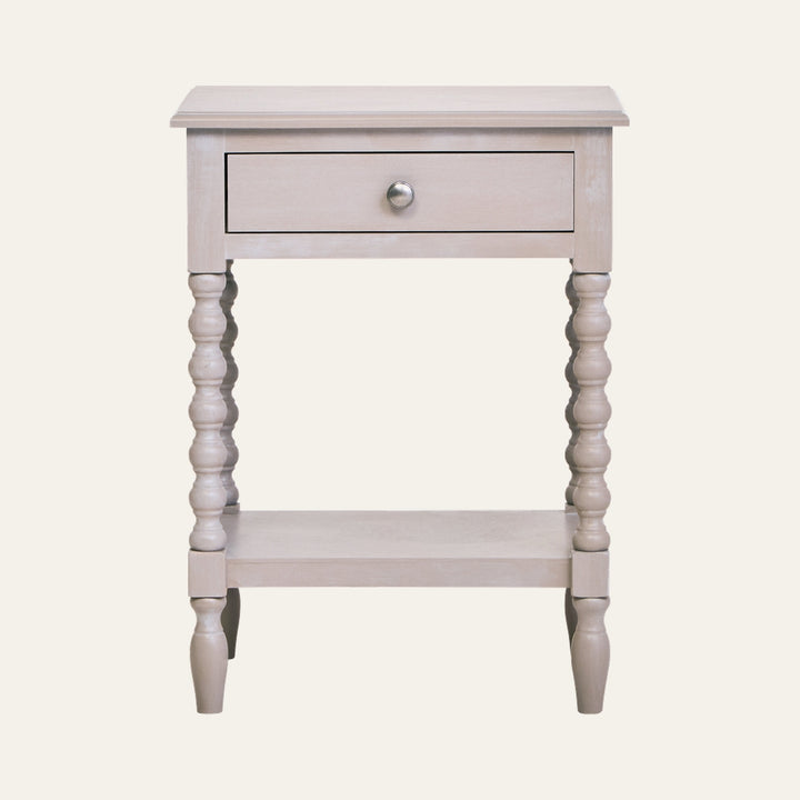 Arlen Bobble Drawer Side Table in light whitewashed wood finish with a single drawer and round metal knob, turned bobble legs and lower shelf.
