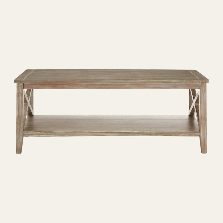 Arlen Wood Coffee Table with rectangular plank top and lower shelf in weathered light wood finish, X-brace side supports and straight legs