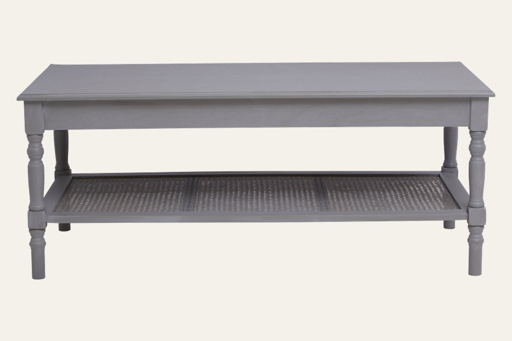 Arlen Wood Coffee Table, rectangular grey painted wood top with turned legs and woven cane lower shelf