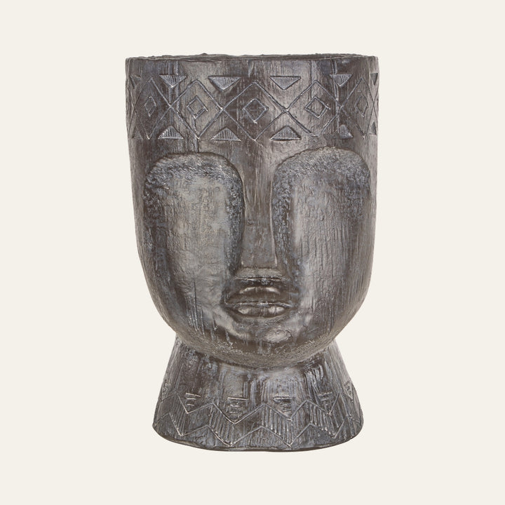 Arric Face Resin Planter, sculpted face-shaped resin planter in a weathered gray-brown finish with carved geometric patterns on the rim and base