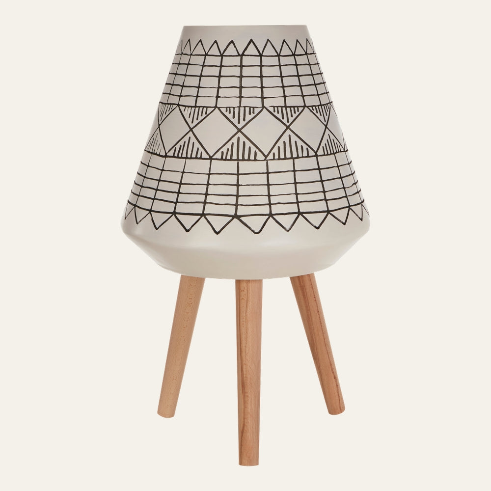 Arric White & Black Planter — white tapered ceramic planter with black hand-drawn geometric pattern, set on three natural wood tripod legs