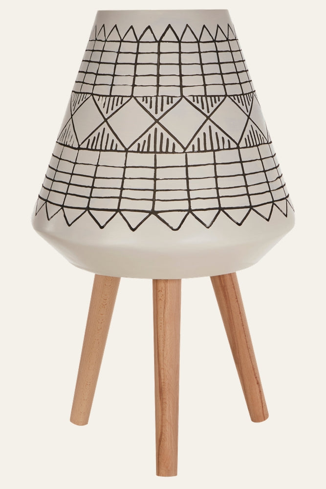 Arric White & Black Planter – white tapered ceramic planter with black hand-drawn geometric pattern sitting on three natural wood legs