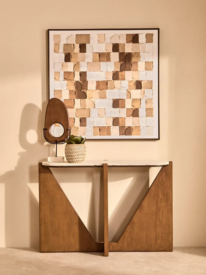 Arsen Wood Vertical Sculpture — vertical oval brown wood sculpture with a central circular cutout on a black metal stand and light rectangular base, styled on a console table
