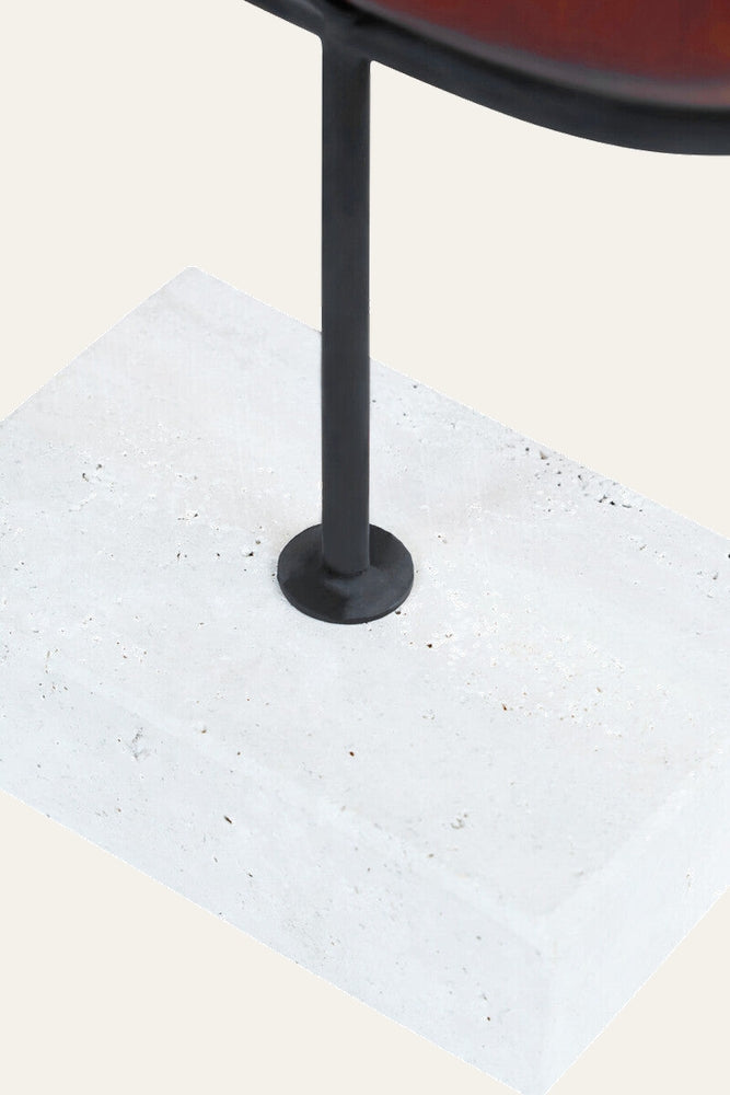Arsen Wood Vertical Sculpture on a white rectangular concrete base with a black metal support rod and a visible dark wood curved edge