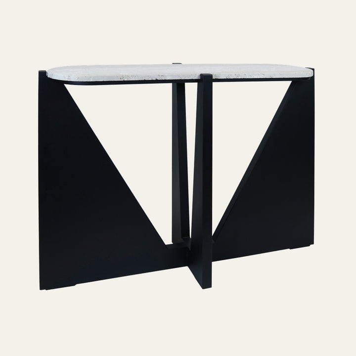 Belin Travertine Console Table with rounded light travertine top and black matte geometric metal base featuring triangular panels