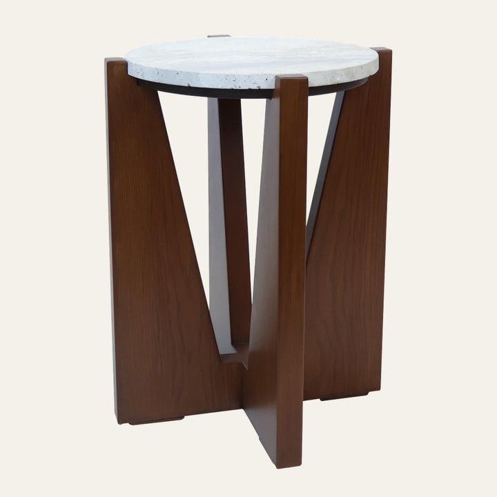 Belin Travertine Side Table with round white travertine top and warm walnut wood base featuring V-shaped angled panels