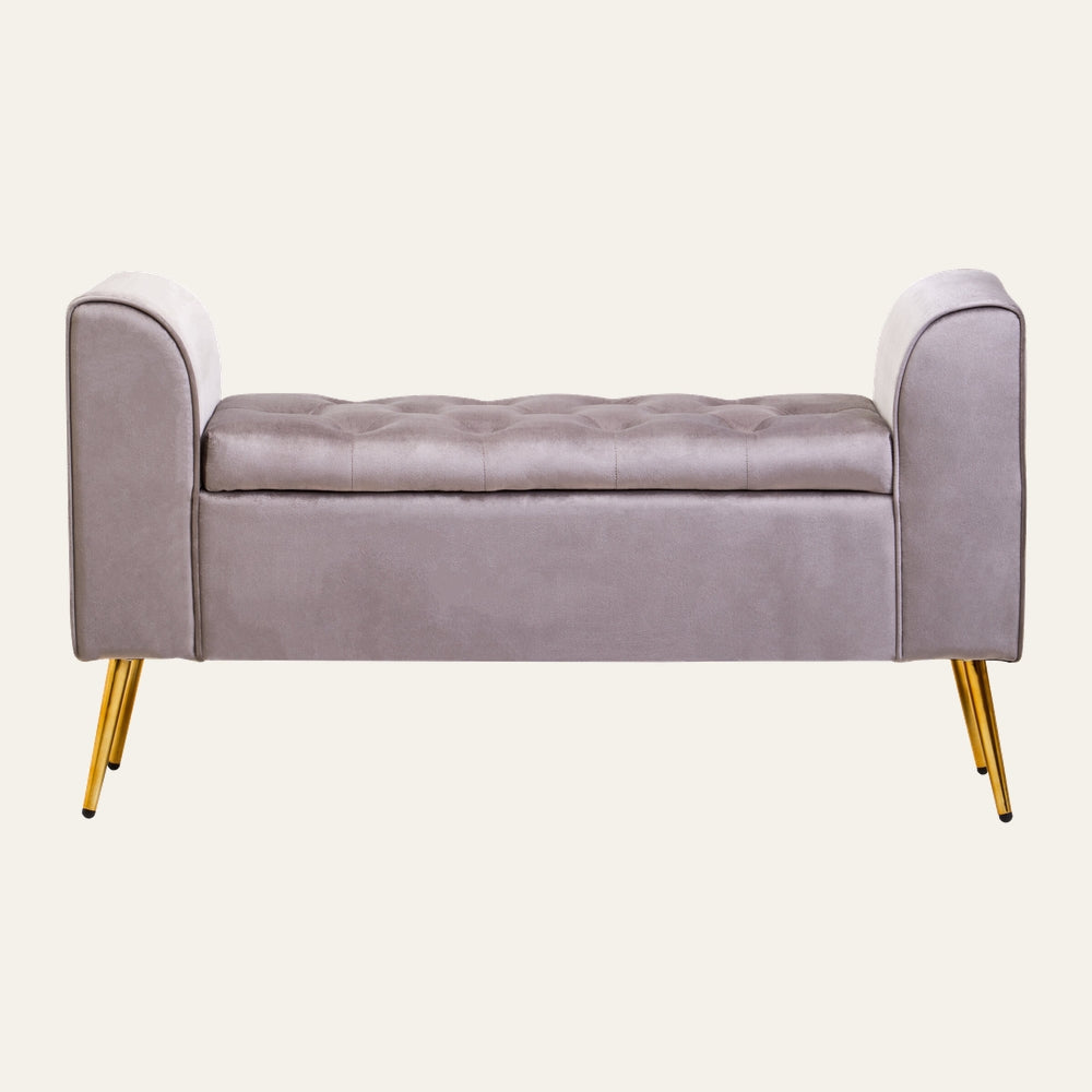 Caelis Mink Velvet Storage Bench with tufted cushioned top, rolled end arms, mink velvet upholstery and angled gold metal legs