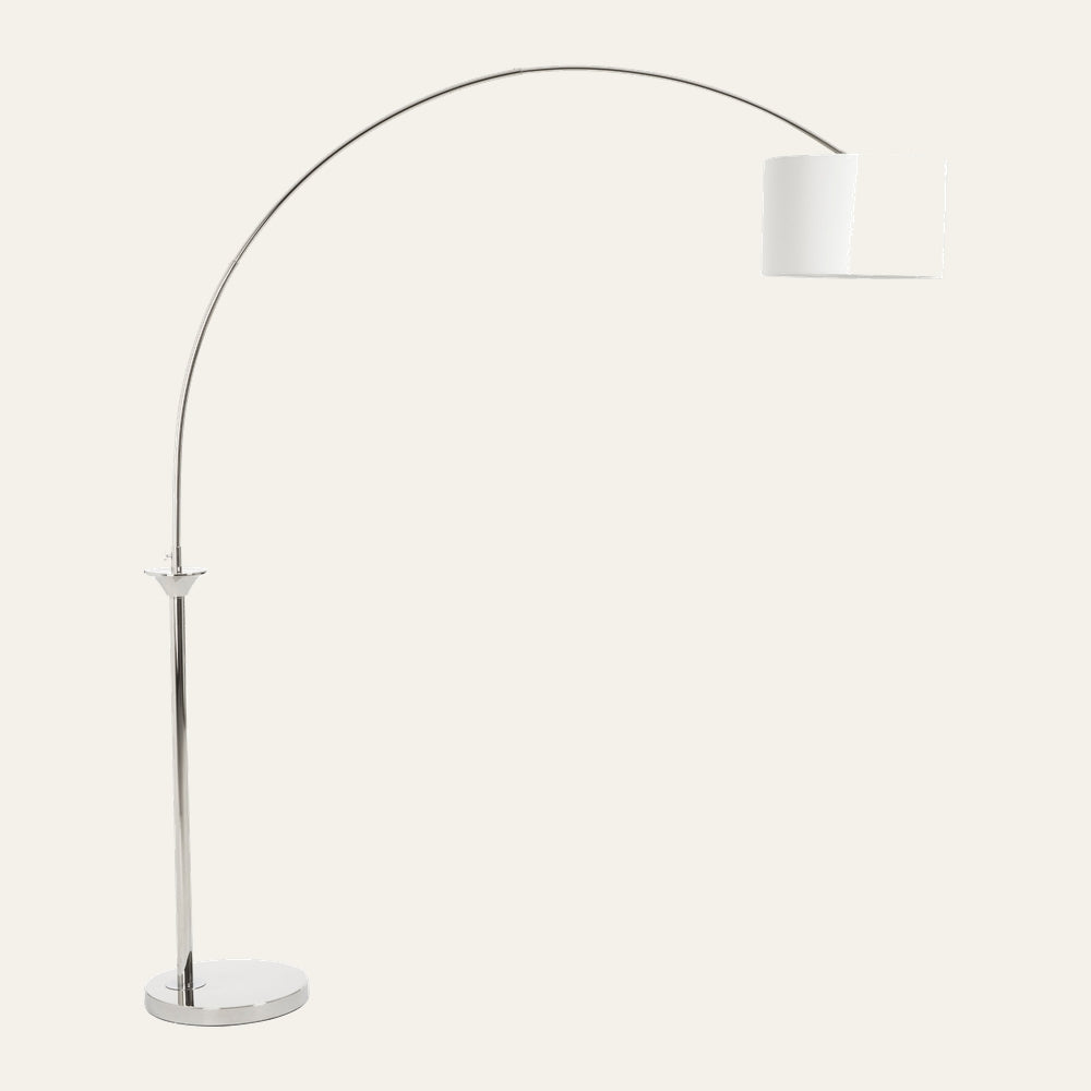 Caesira Nickel Arc Floor Lamp with long nickel arched stem, round nickel base, and white cylindrical drum shade