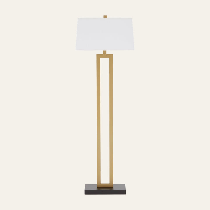 Celdora Floor Standing Floor Lamp with open rectangular brass-finish metal frame, white rectangular shade, and dark rectangular base