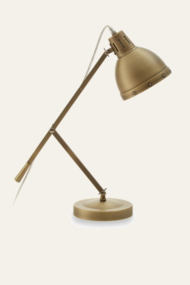 Corar Adjustable Brass Desk Lamp with adjustable two-joint brass arm, riveted dome shade and round weighted brass base