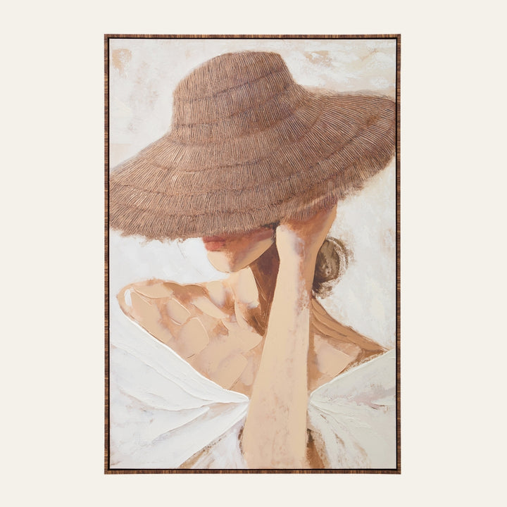 Dorven Wall Art — textured painting of a woman with a wide woven straw hat obscuring her face, off-shoulder white dress, soft neutral beige tones, shown in a thin wood frame.