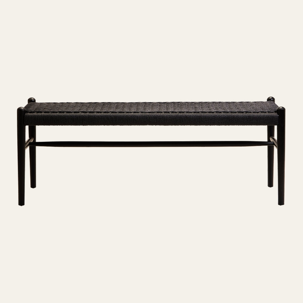 Drevan Rope Wood Bench with black woven rope seat, dark wood frame, slim rounded legs and a central stretcher