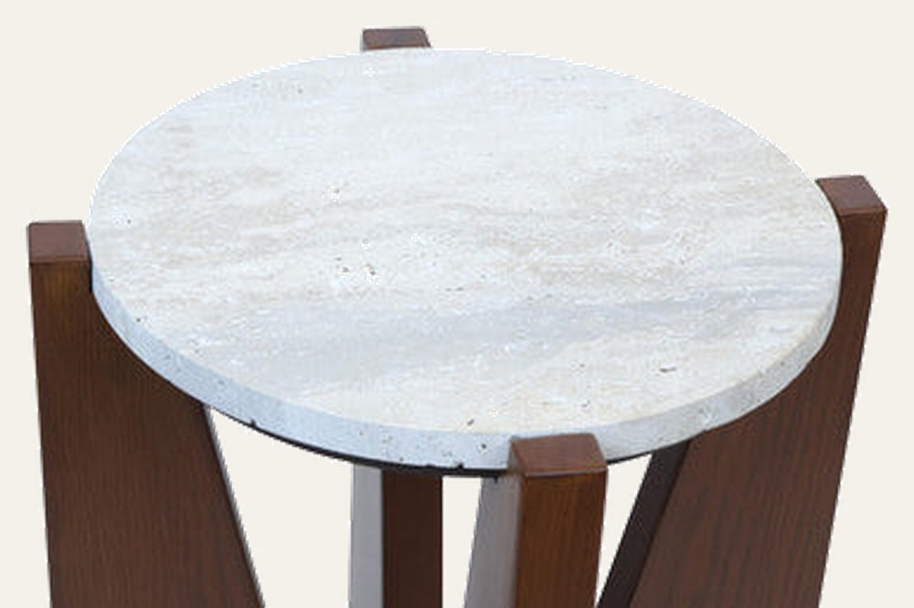 Elsen Travertine Side Table with round pale travertine stone top supported by four dark brown rectangular wooden legs