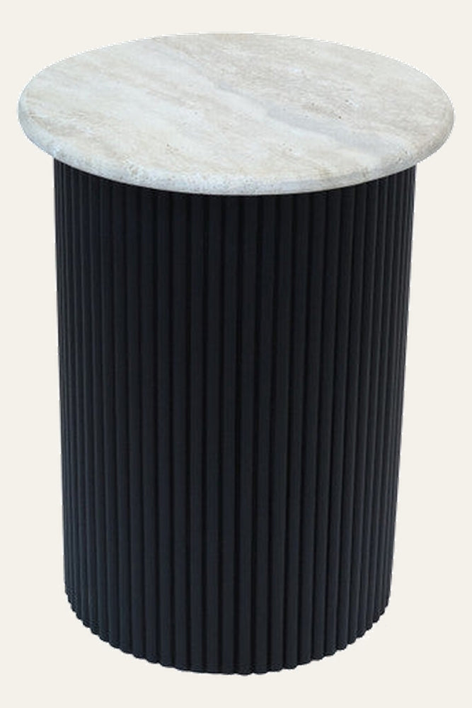 Elsen Travertine Side Table with round light travertine top and tall fluted black cylindrical base