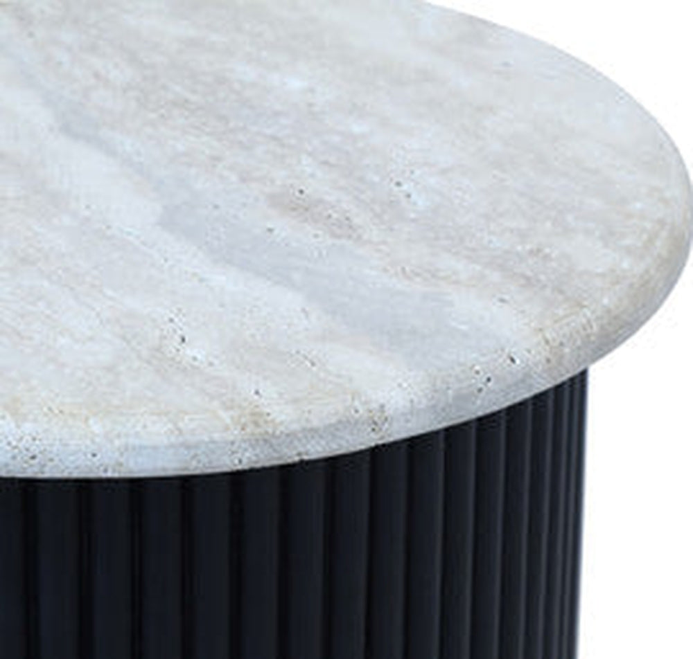 Elsen Travertine Side Table with round light travertine top showing natural veining and a black vertical fluted cylindrical base.