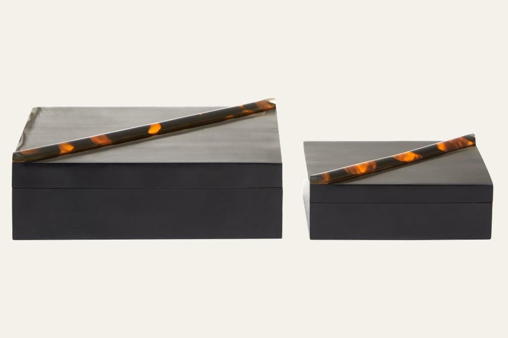 Elsi Tortoise Shell Trinket Box Set — two rectangular matte black trinket boxes (large and small) with diagonal tortoise-shell patterned resin accents across each lid