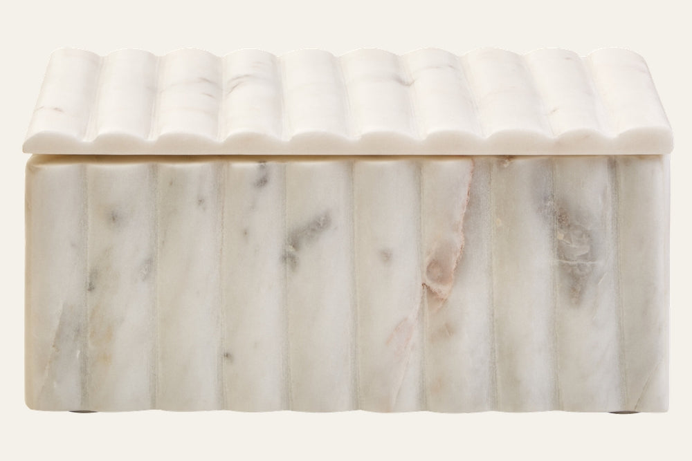 Erayana Fluted Marble Box — rectangular white marble box with vertical fluted ridges and scalloped fluted lid, subtle gray and pink veining