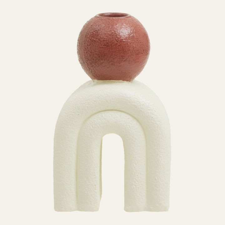 Eriya Candle Holder with cream textured arch-shaped base topped by a terracotta-colored textured spherical candle cup with visible socket