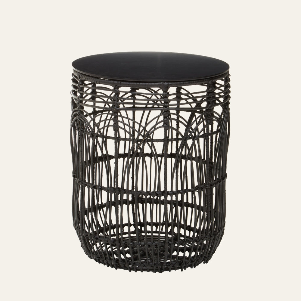 Eselle Round Rattan Side Table with round matte black top and open-weave black rattan cylindrical base