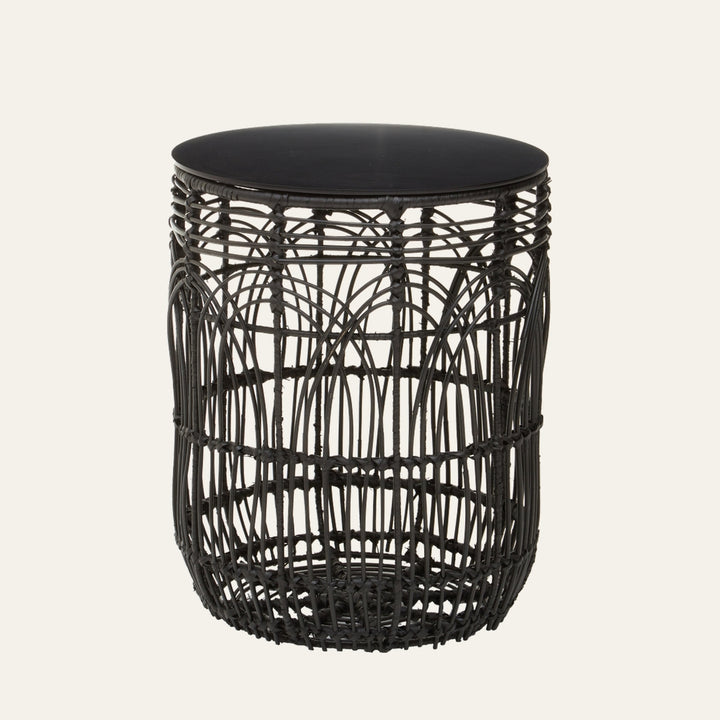 Eselle Round Rattan Side Table with round matte black top and open-weave black rattan cylindrical base