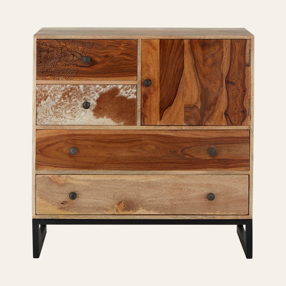 Esvora Mango Wood Sideboard with mixed mango wood drawer fronts, carved floral detail on top-left drawer, cowhide-patterned second-left drawer, single right-door panel, round black metal knobs and black metal legs