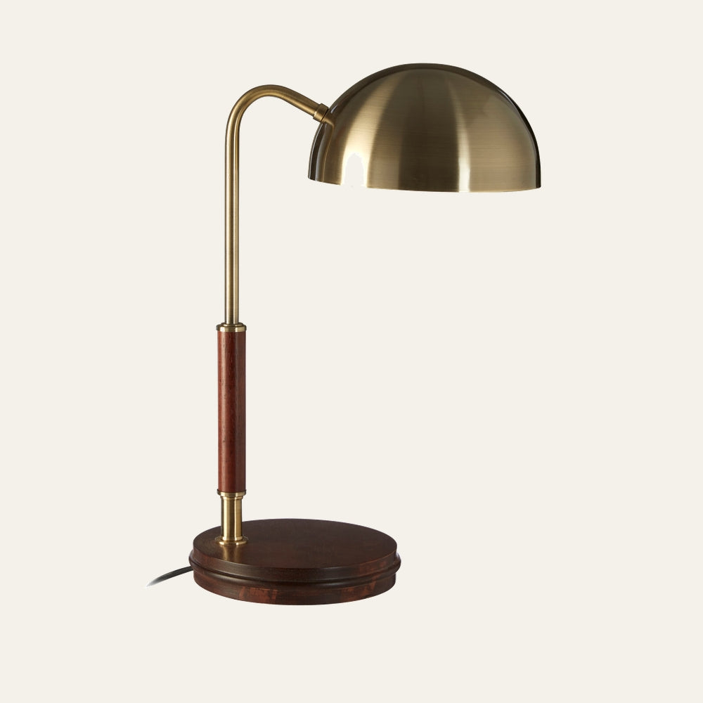 Evania Brass Wood Task Lamp with brushed brass dome shade, curved brass arm, polished wood stem and round dark wood base