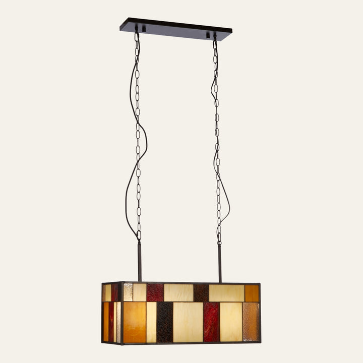 Evaya Ceiling Light — rectangular stained-glass pendant with amber, cream, red and brown glass panels in a dark bronze metal frame, suspended by two chains from a rectangular ceiling canopy.