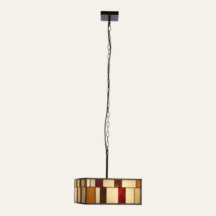 Evaya Open Frame Ceiling Light – hanging rectangular stained-glass drum pendant with amber, cream and red glass panels set in a dark bronze metal frame and chain
