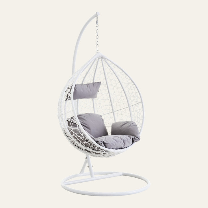 Evira Rattan Effect Hanging Chair — white woven rattan-effect egg-shaped hanging chair on a white metal stand with light grey seat and back cushions