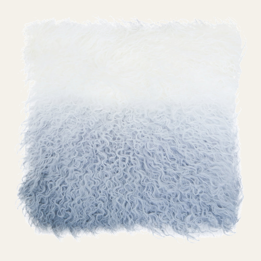 Ezelle Cushion — square shaggy long-curly faux-fur cushion with a white-to-light-blue ombré