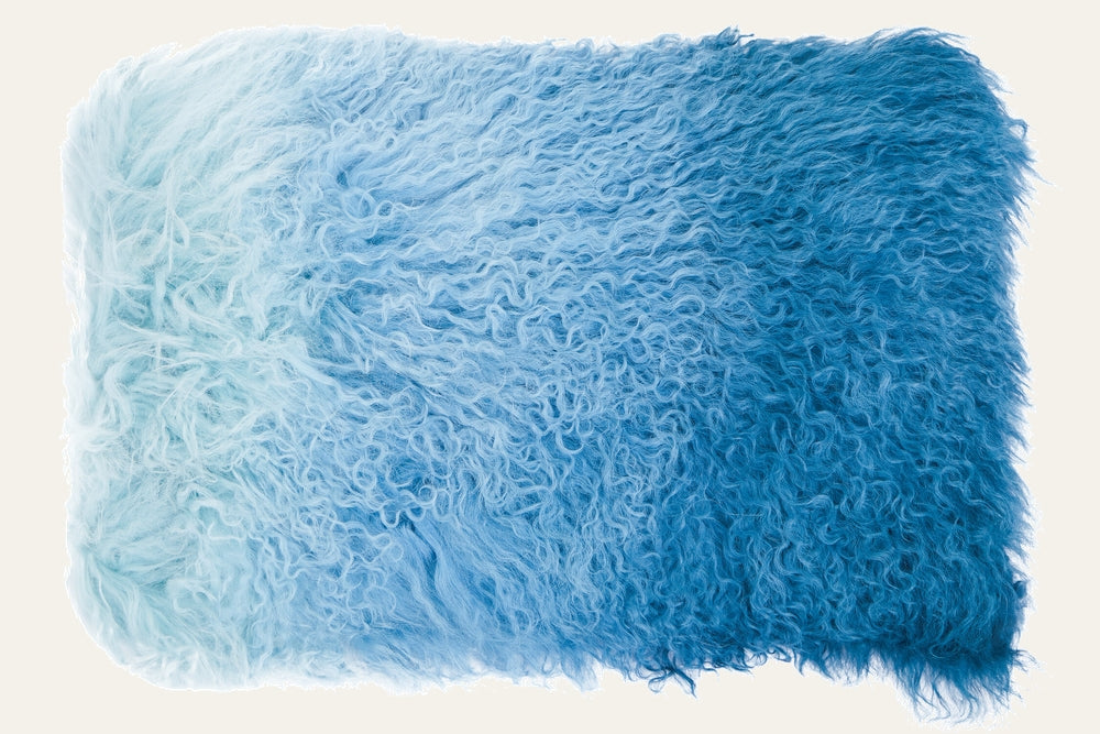Ezelle Rectangular Cushion with shaggy curly fur-like long-pile cover in an ombre blue gradient from pale aqua to deep teal