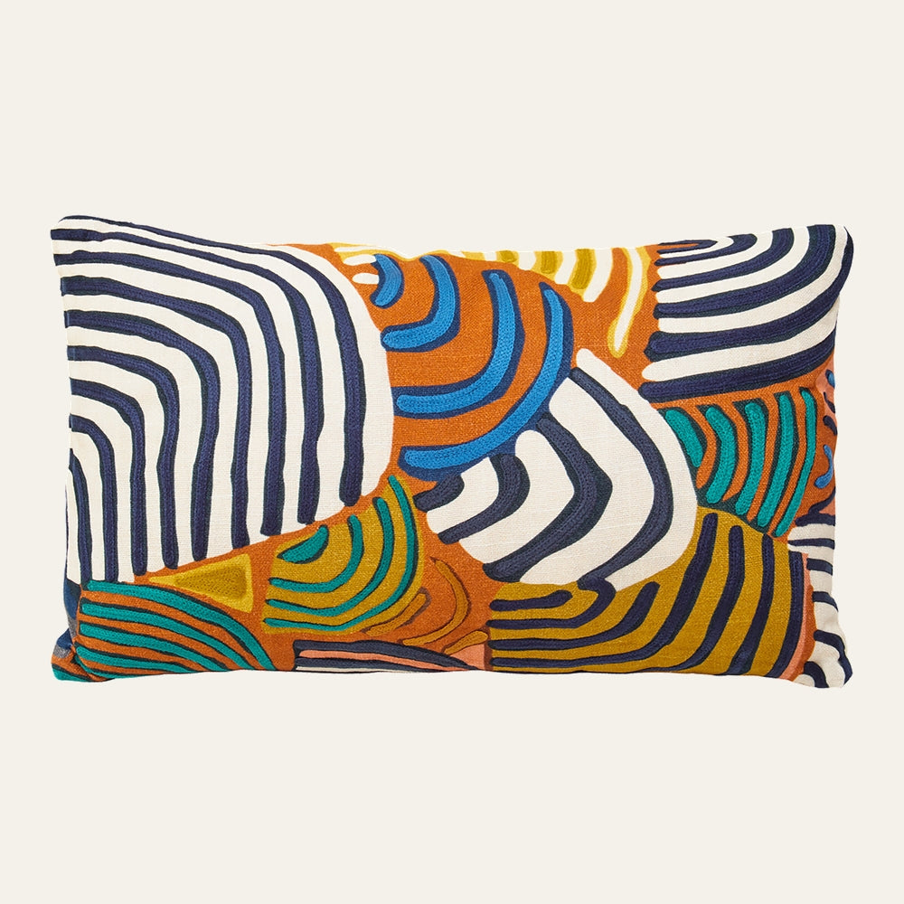 Ezelle Rectangular Fabric Cushion with bold multicolored abstract curved stripe embroidery in navy, white, orange, teal and mustard on a rectangular fabric cover