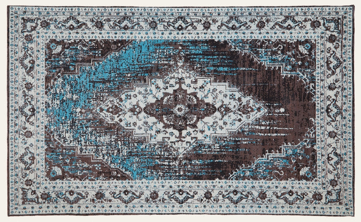 Ezelle Rug | Morvi Rug - rectangular rug with a distressed vintage-style central medallion and decorative floral border in turquoise, dark brown, and cream.