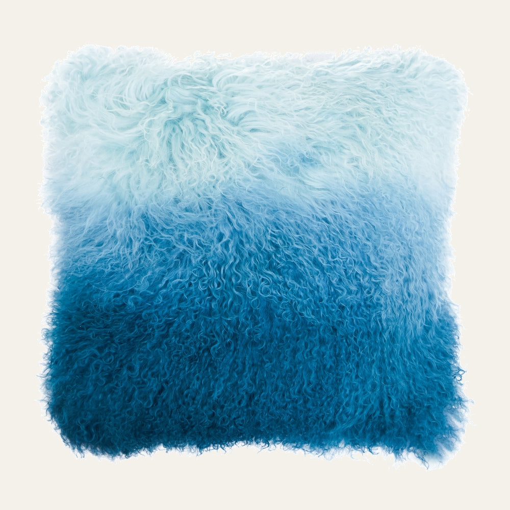 Ezelle Square Cushion with long curly shaggy fur in blue ombre, light aqua top fading to deep teal bottom.