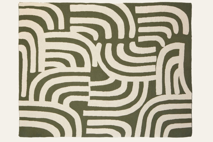 Ezelle Throw | Ozella Throw — olive green and cream woven throw with bold abstract curved stripe pattern