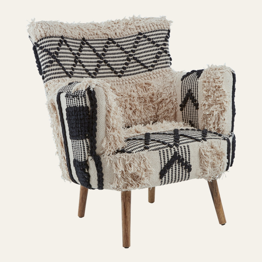 Fenlor Berber Accent Chair with cream woven upholstery, black geometric woven pattern and shaggy fringe, padded arms and seat, angled natural wood legs