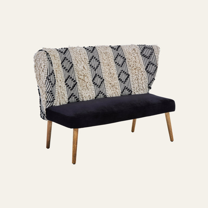 Fenlor Moroccan Wood Fabric Bench with black upholstered seat, textured cream-and-black Moroccan-pattern back with shaggy stripes, and tapered natural wood legs