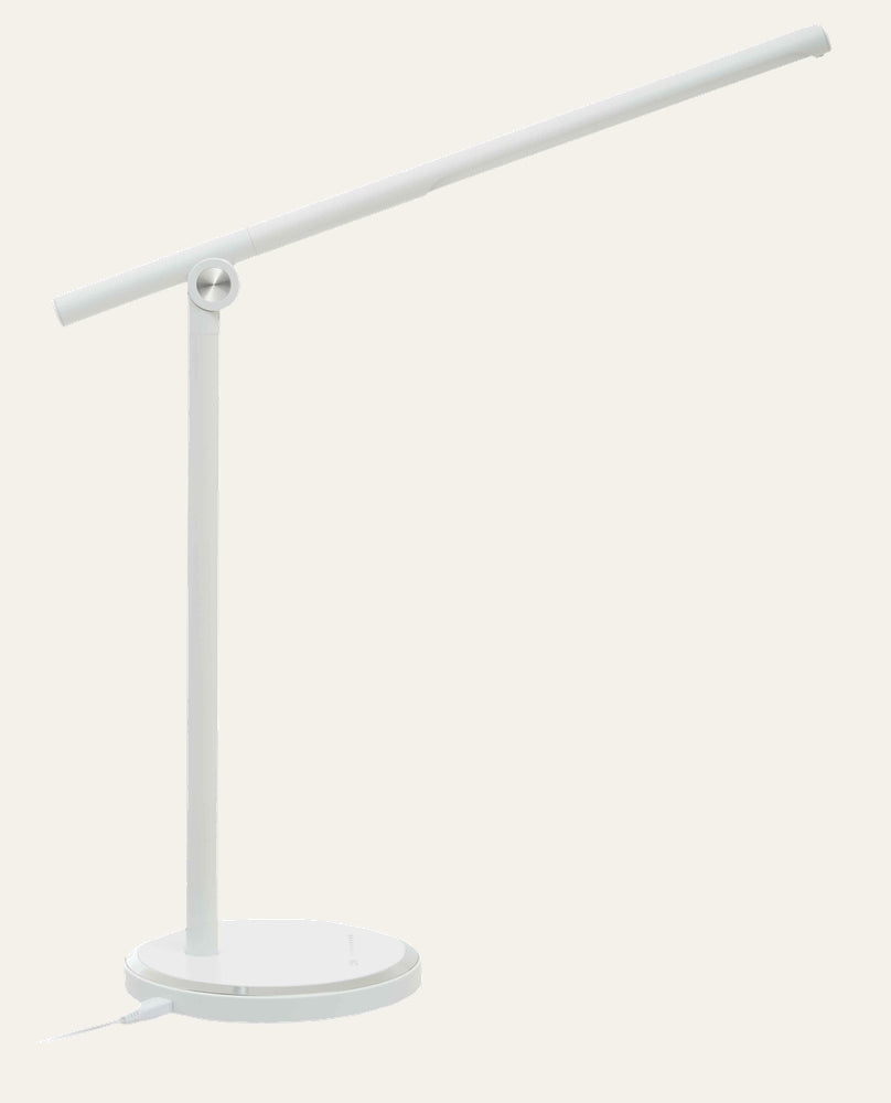 Galven Round Table Lamp, white with a slim vertical stem, adjustable tubular horizontal light arm, round base with silver circular hinge and visible power cord