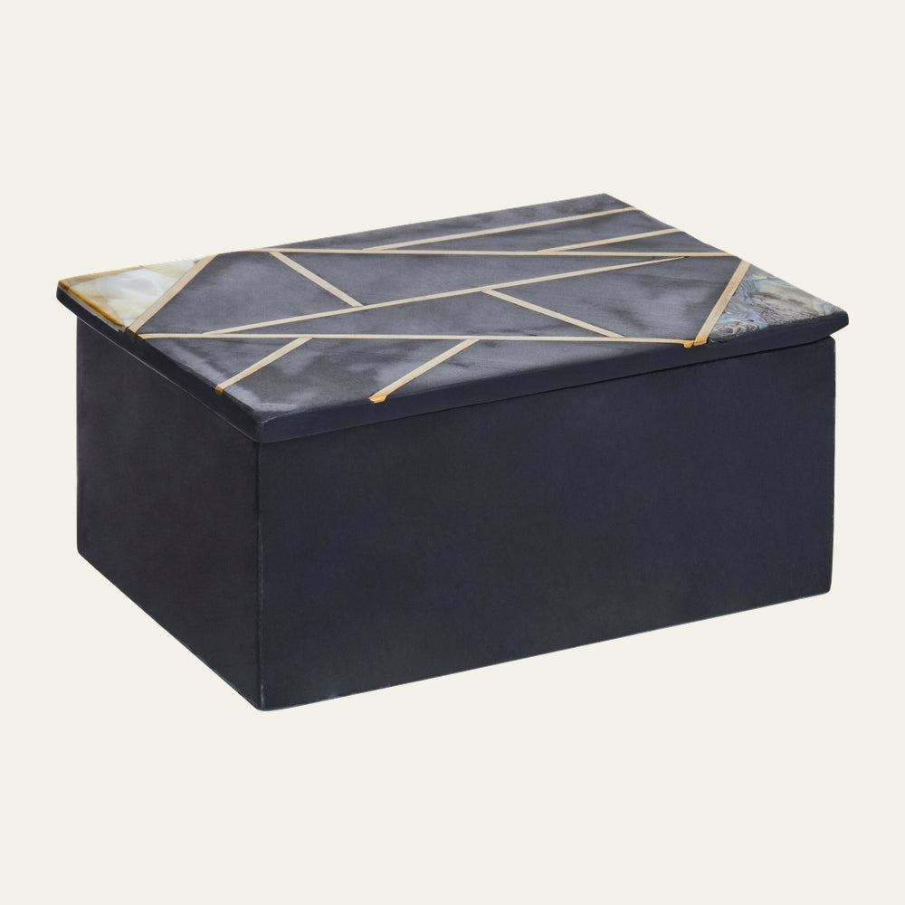 Hadrin Slate Trinket Box — rectangular dark slate-finish box with geometric gold-tone inlay on the lid and iridescent shell corner accents.