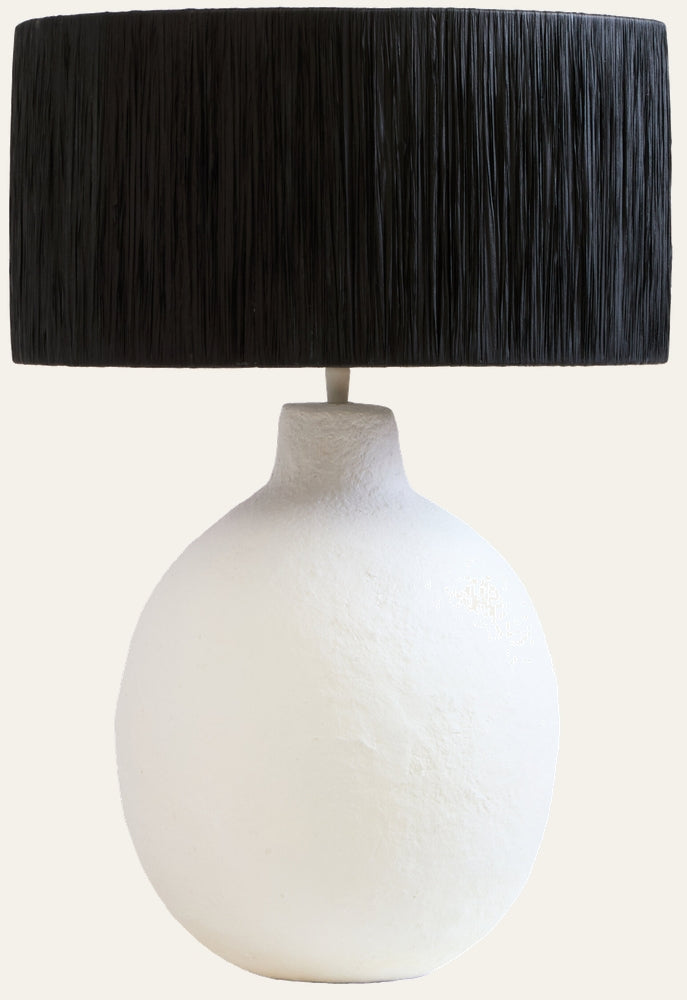 Irdan Table Lamp with a matte textured white round base and a black textured drum shade