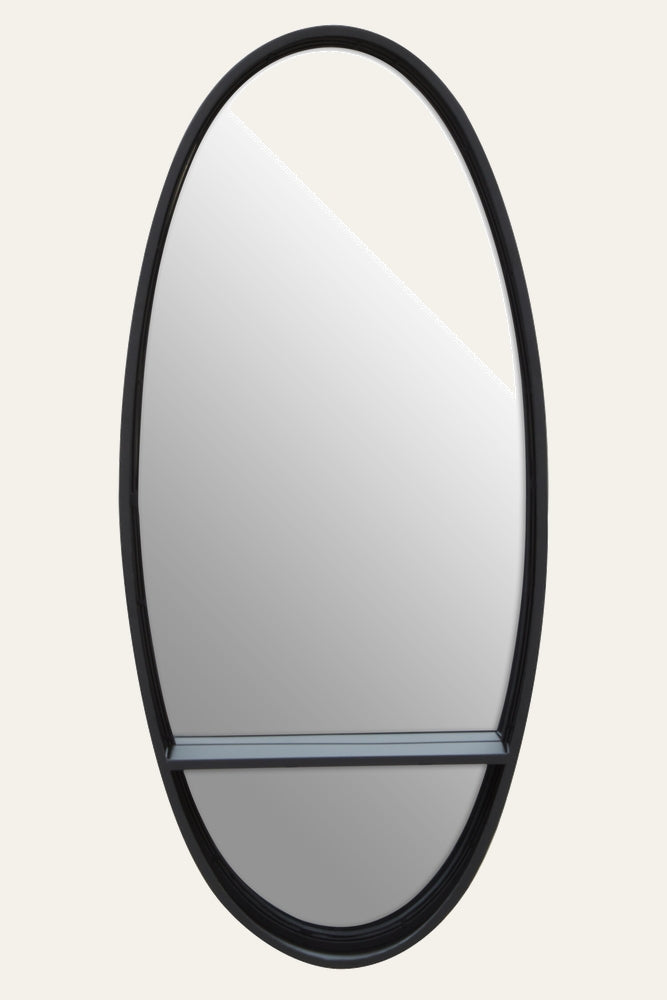 Lorin Oval Wall Mirror with thin black metal oval frame and narrow horizontal shelf across the lower third