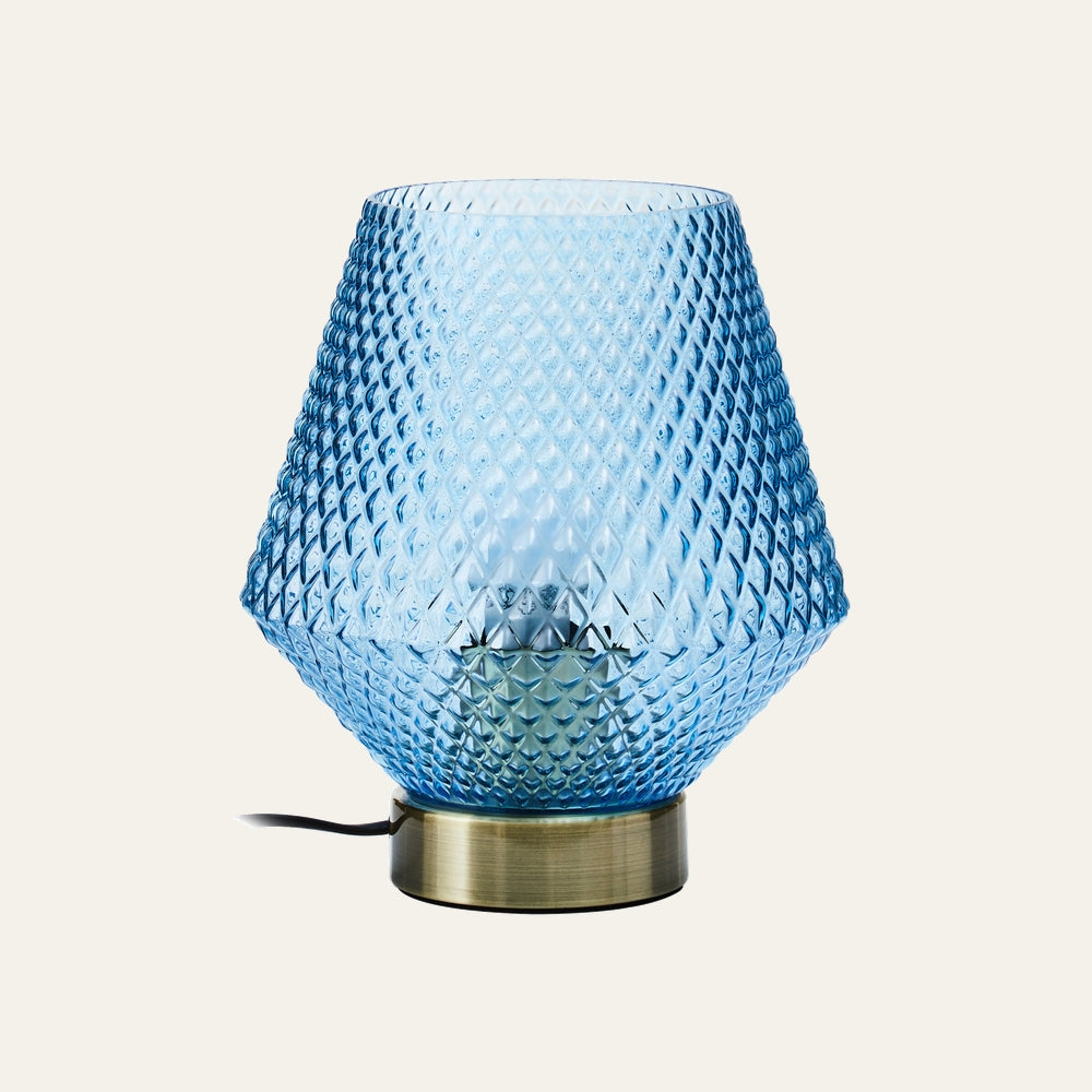Lysara Table Lamp with blue diamond‑pattern textured glass shade and brushed brass base, black power cord visible