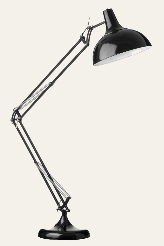 Neraya Metal Floor Lamp — glossy black metal adjustable double-arm floor lamp with domed shade, exposed chrome springs and round weighted base